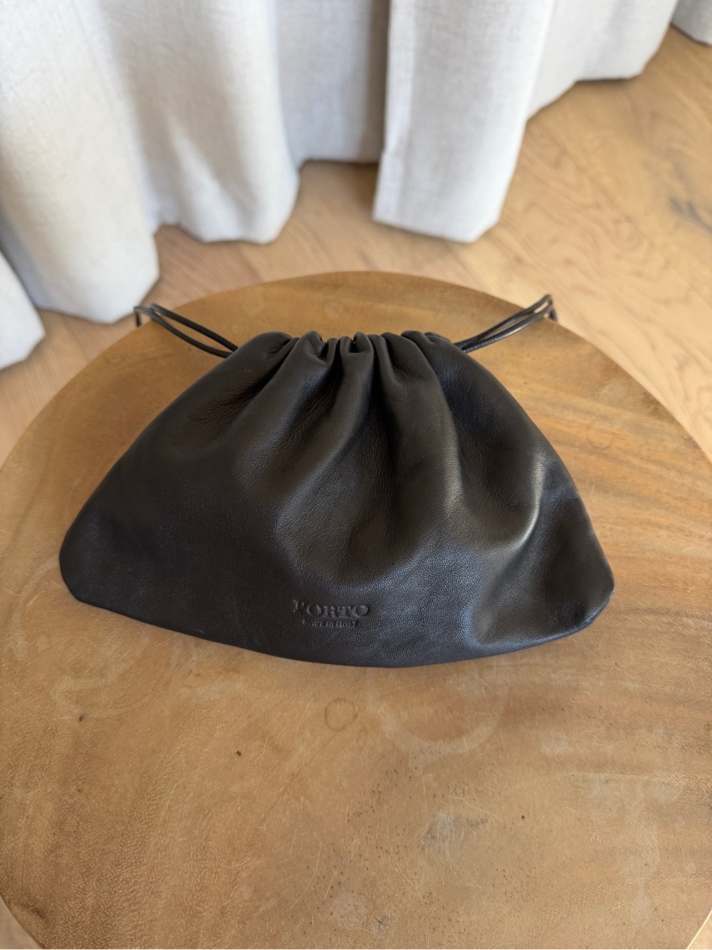 Porto Black Leather Drawstring Clutch